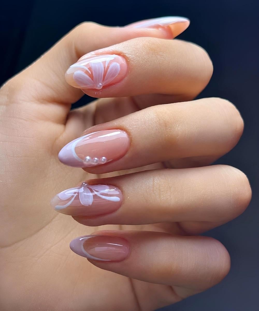 Lilac and white nails with flowers and pearls