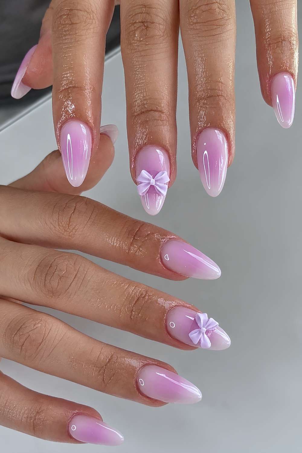 Lilac aura nails with 3d bows