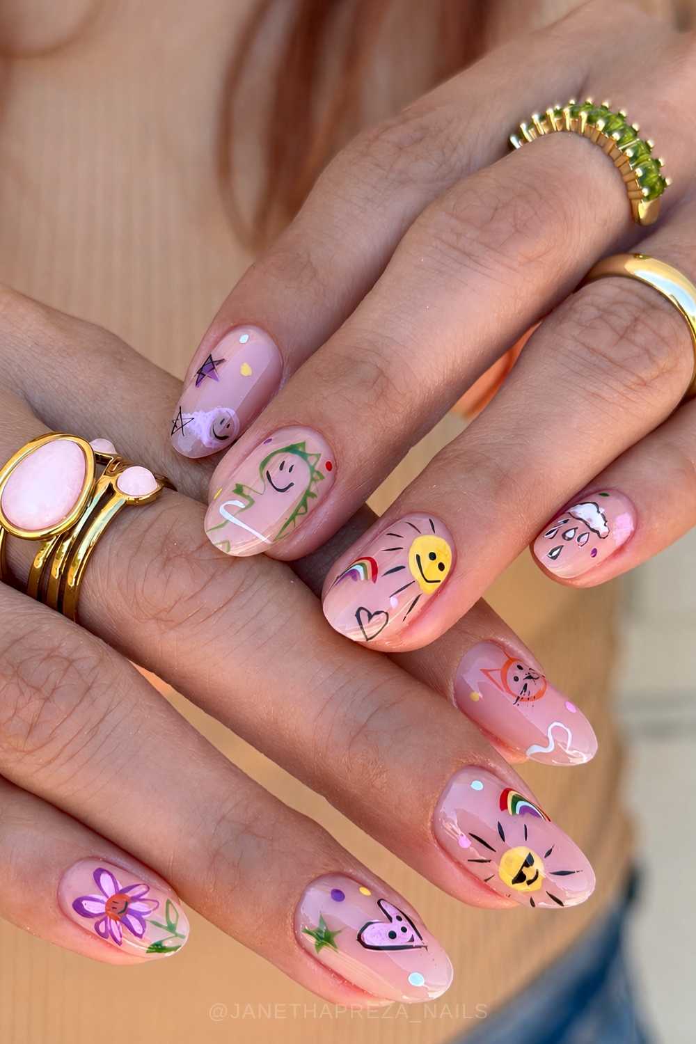 Milky nails with colorful doodle art