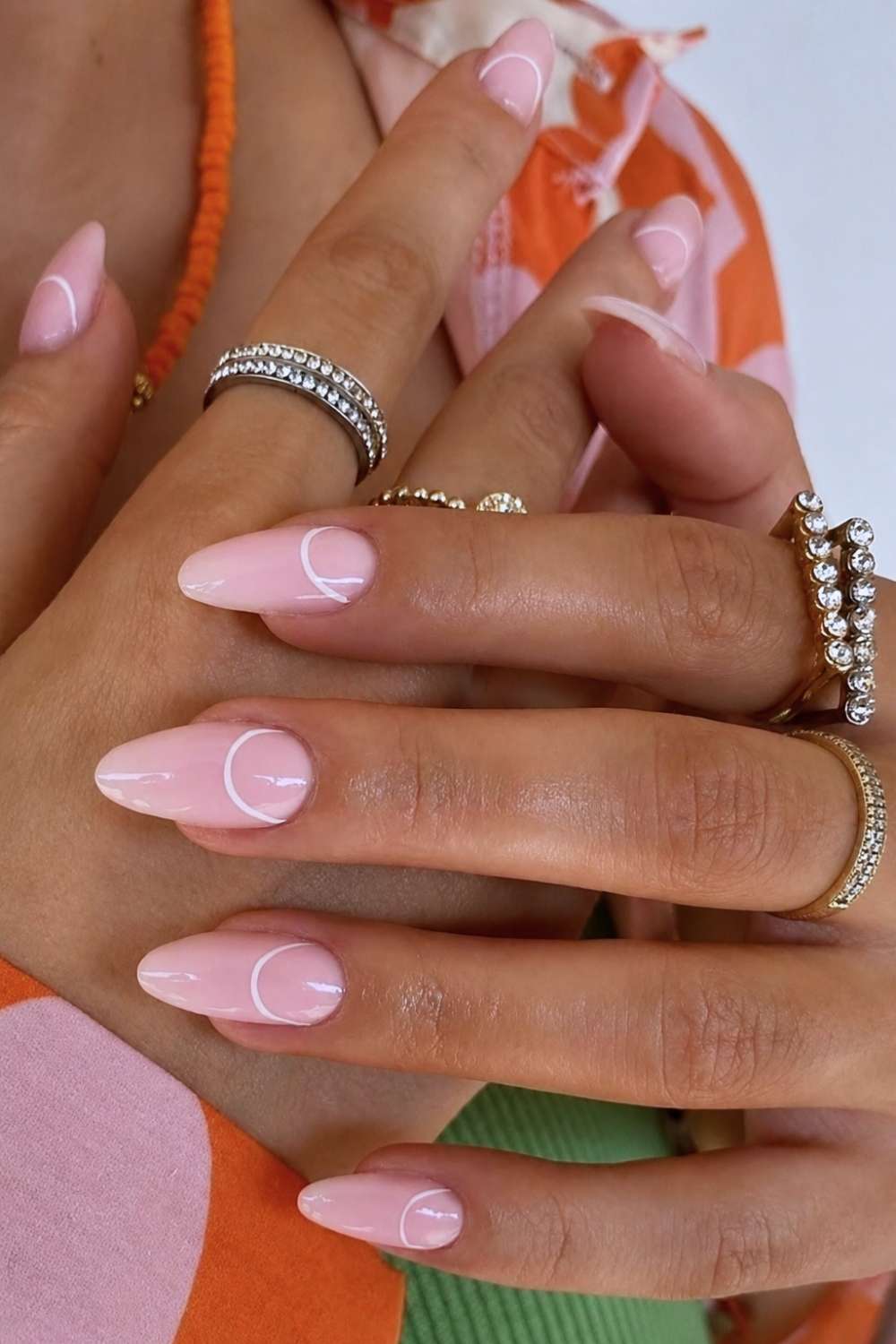 Milky pink nails with white half moon outlines