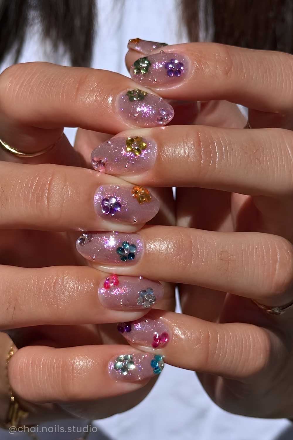 Pink velvet nails with gem florals