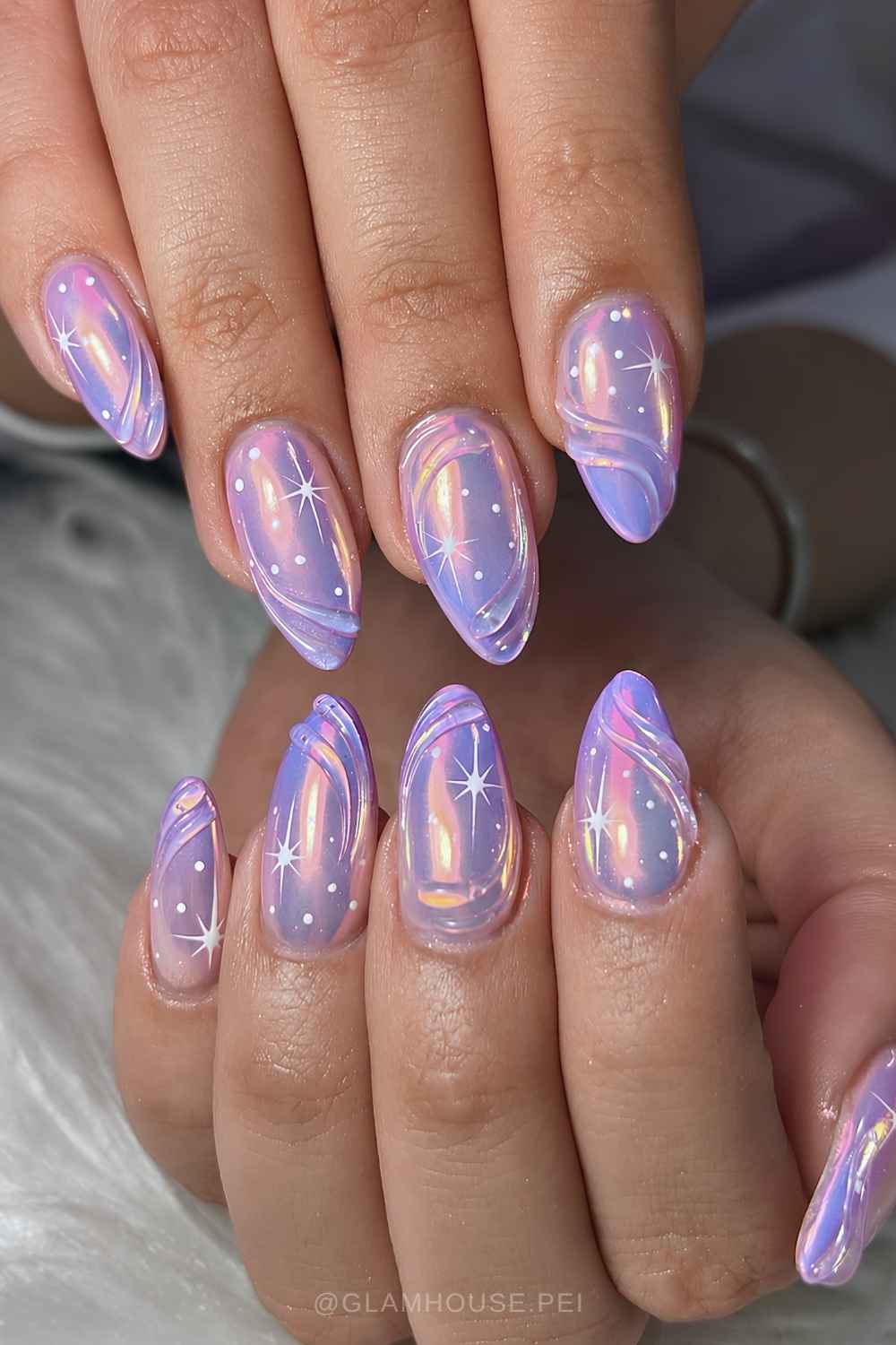 Purple holographic nails with star art