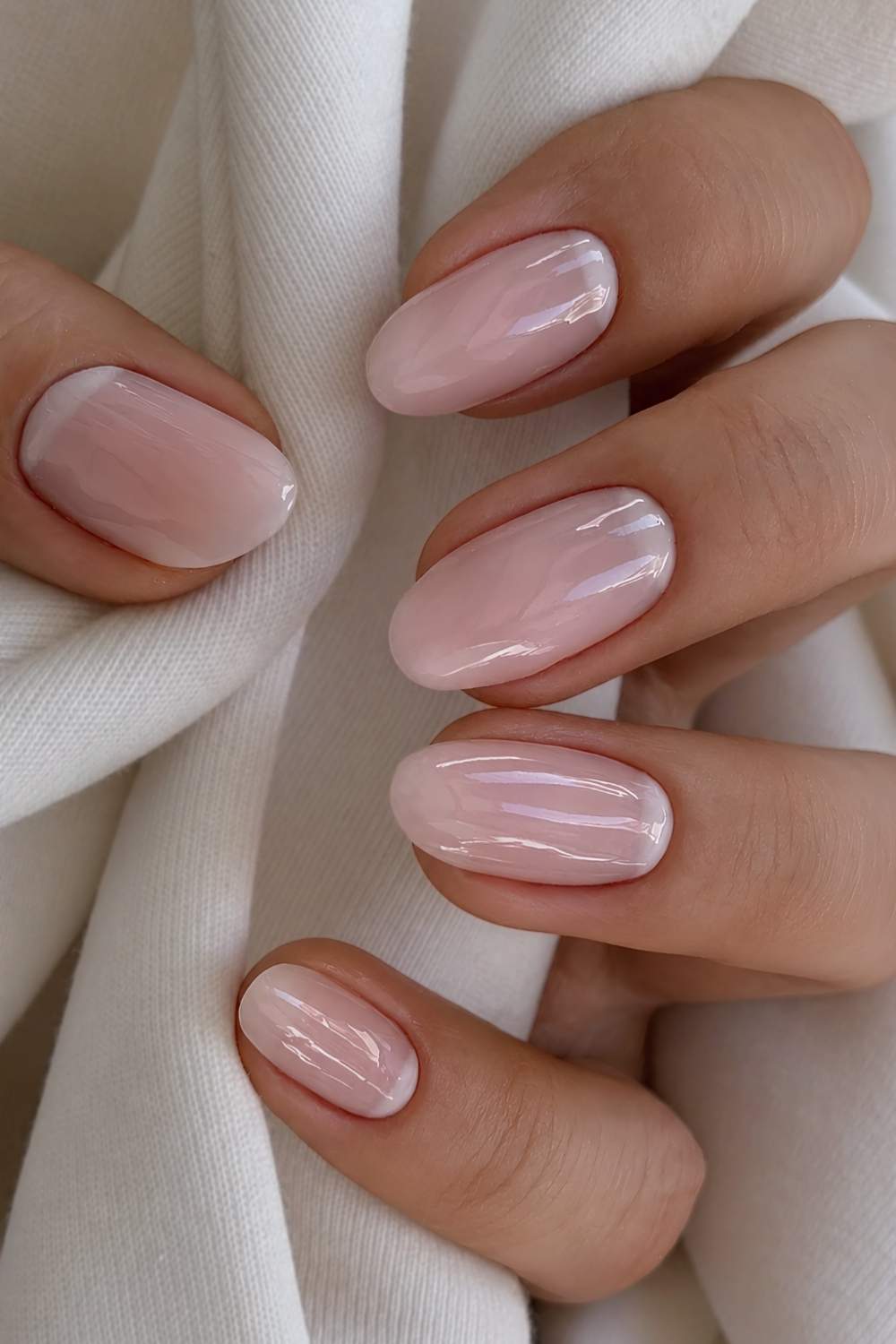 Sheer and glossy nails with accent half moons
