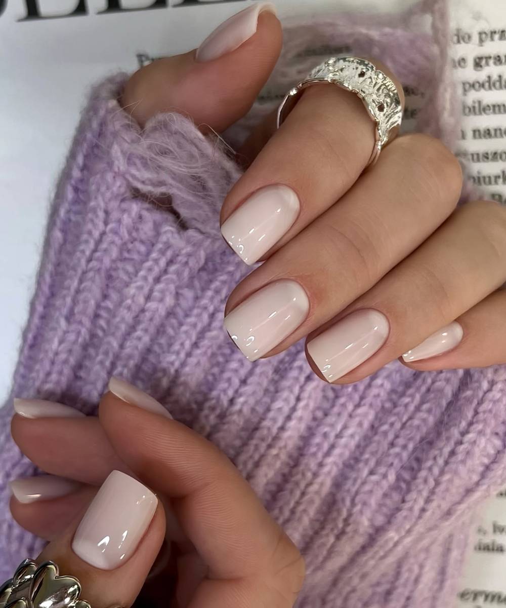 Short milky white nails with half moons