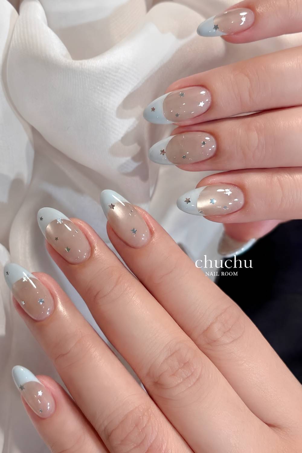Starry blue French mani on cat eye base