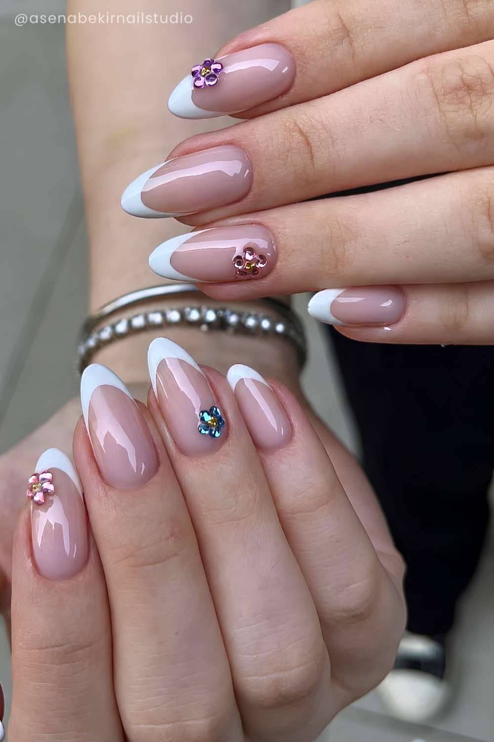 White French mani with gem flowers