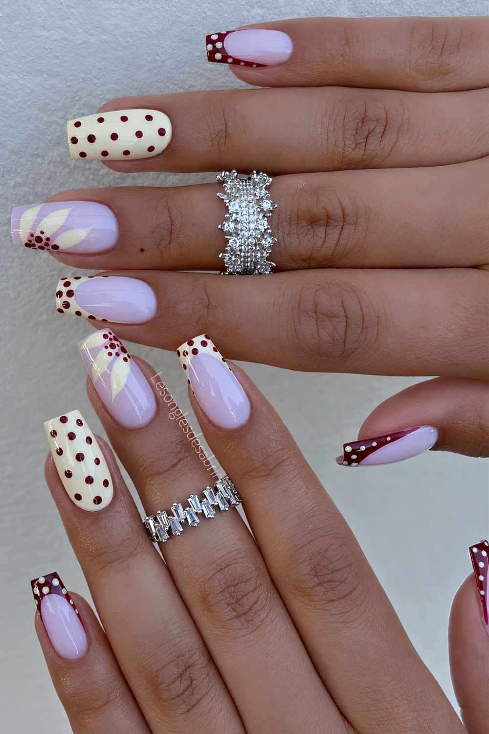 Burgundy and yellow nails with dots and sunflowers