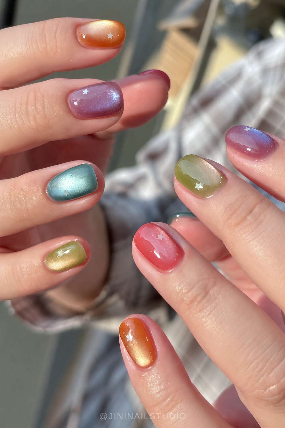 Colorful cat eye nails with micro stars