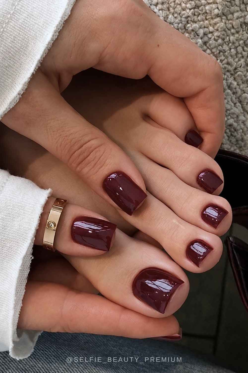 Maroon manicure and pedicure
