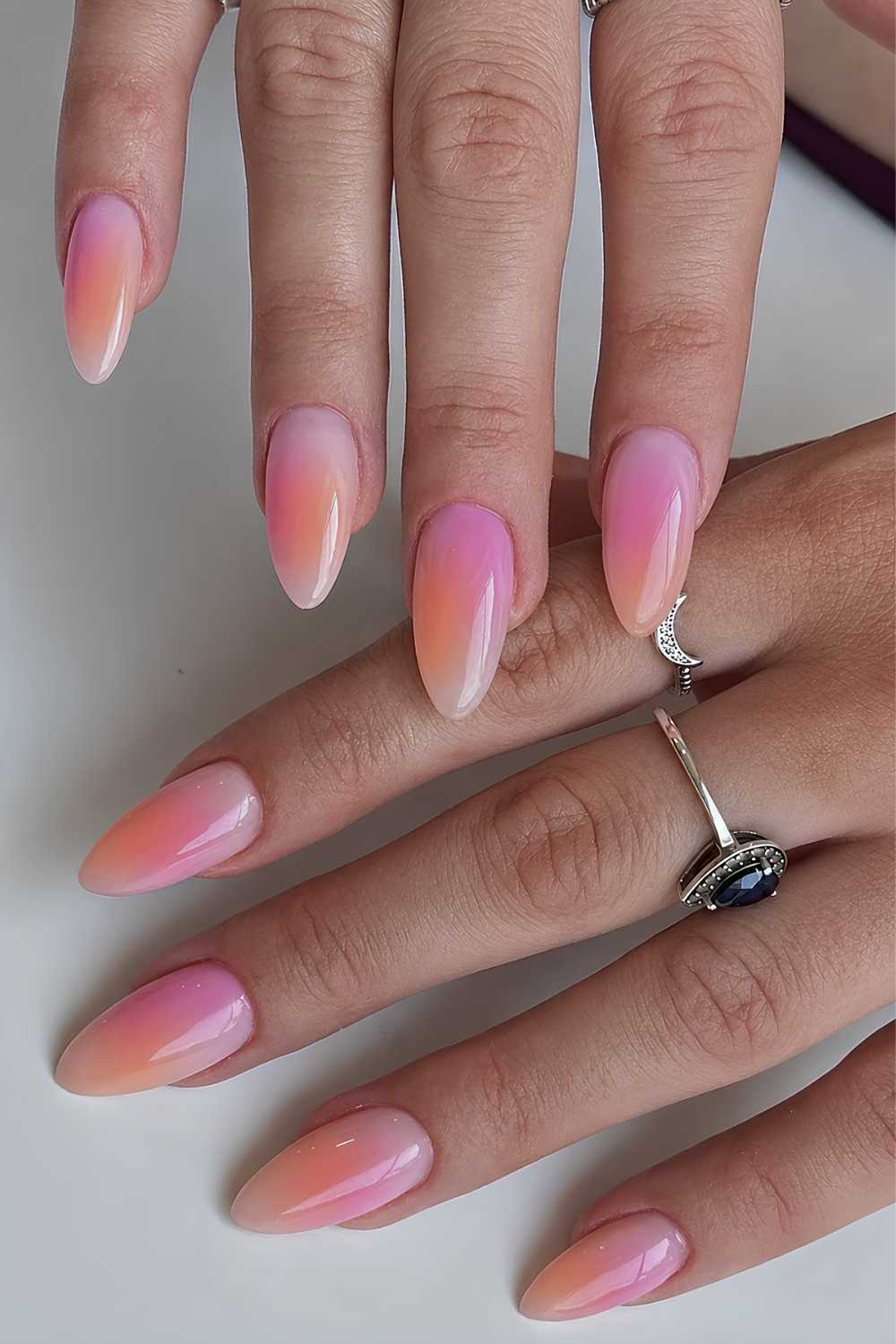 Milky nails with pink and orange gradient blend