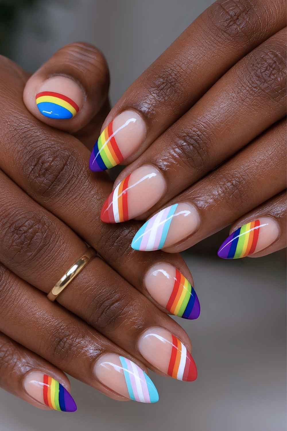 Neutral mani with rainbow stripe art