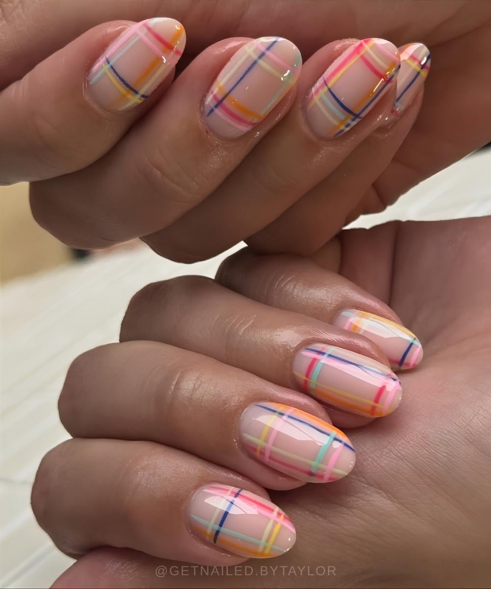 Neutral nails with colorful plaid art