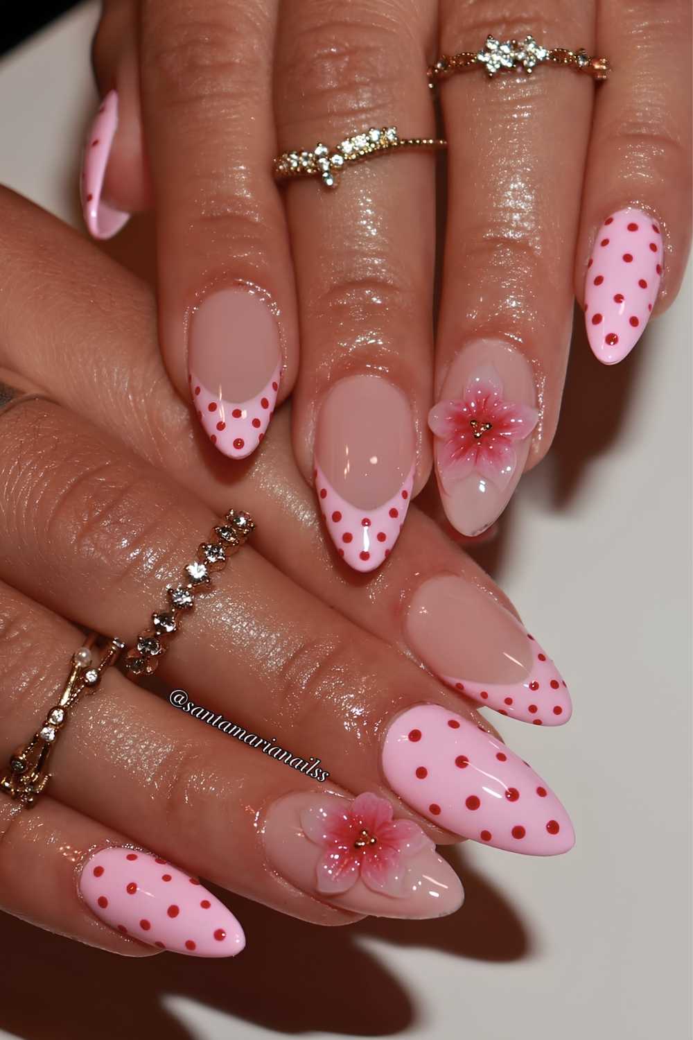 Pink nails with red dots and flowers