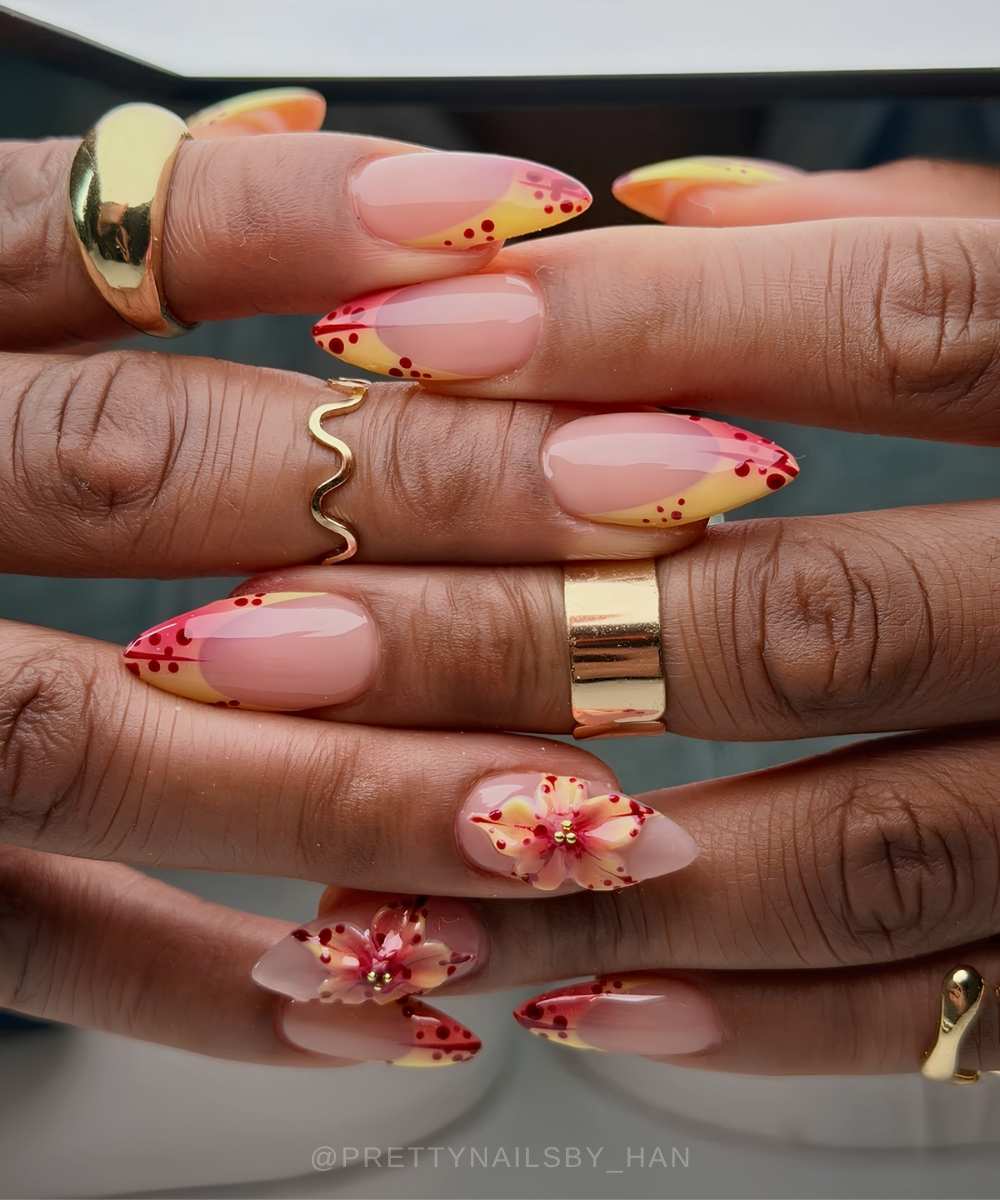 Red and yellow tropical floral nails