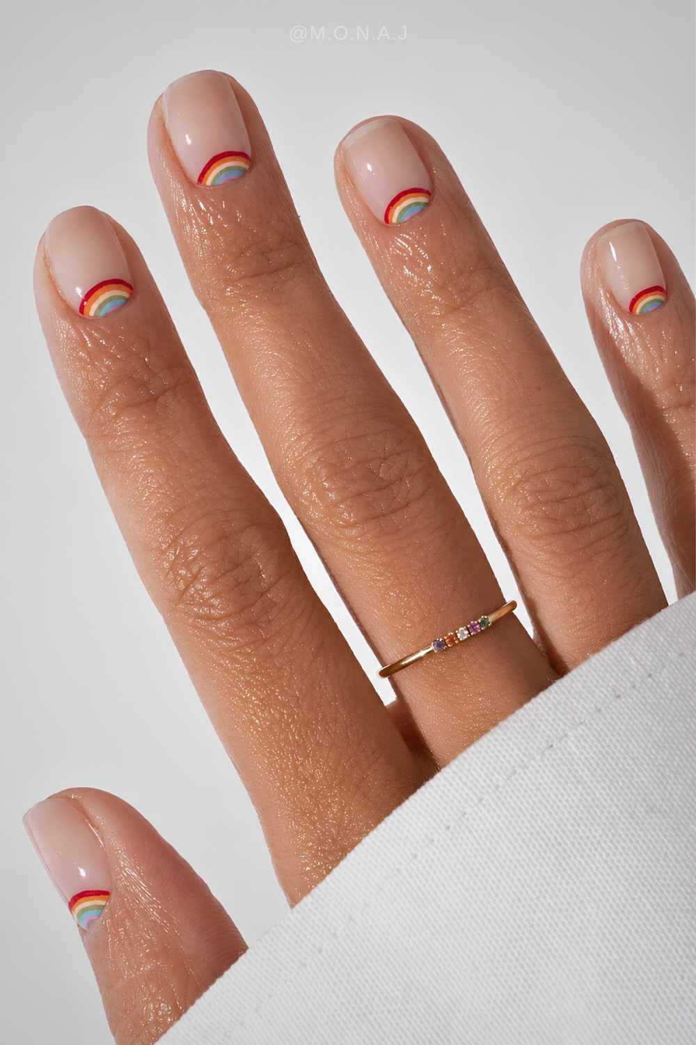 Short nails with cuticle rainbow art