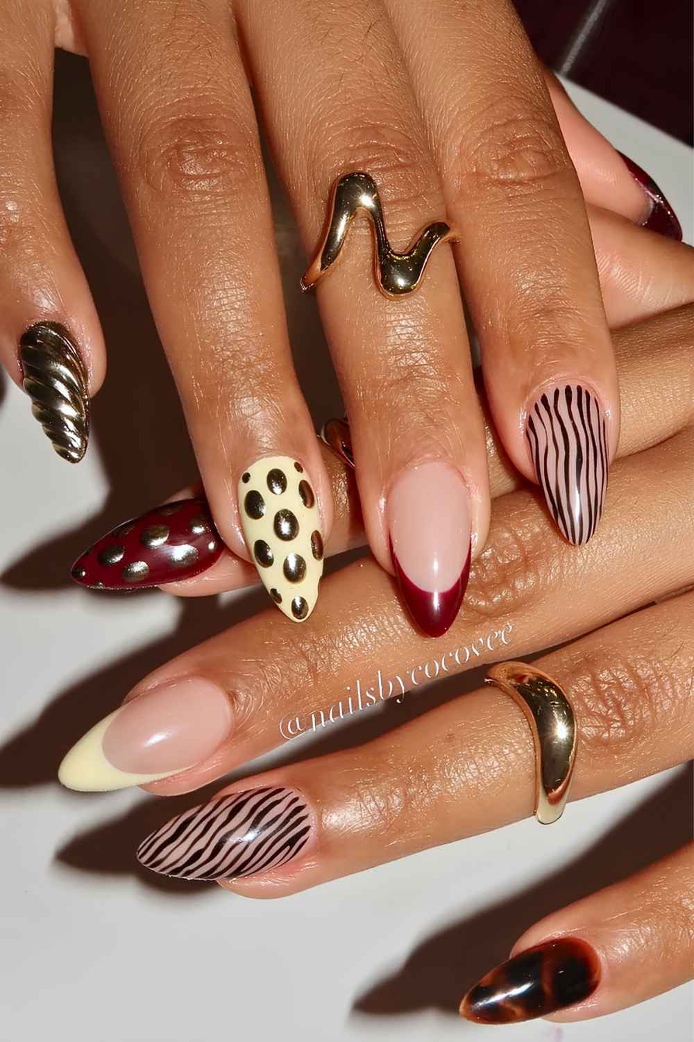 Yellow and burgundy nails with tortoise shell