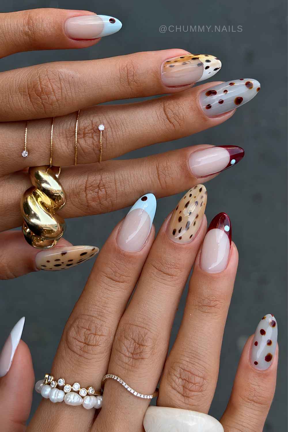 Blue and burgundy nails with deer print accents