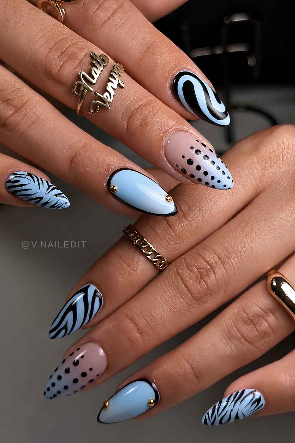 Blue nails with abstract black art