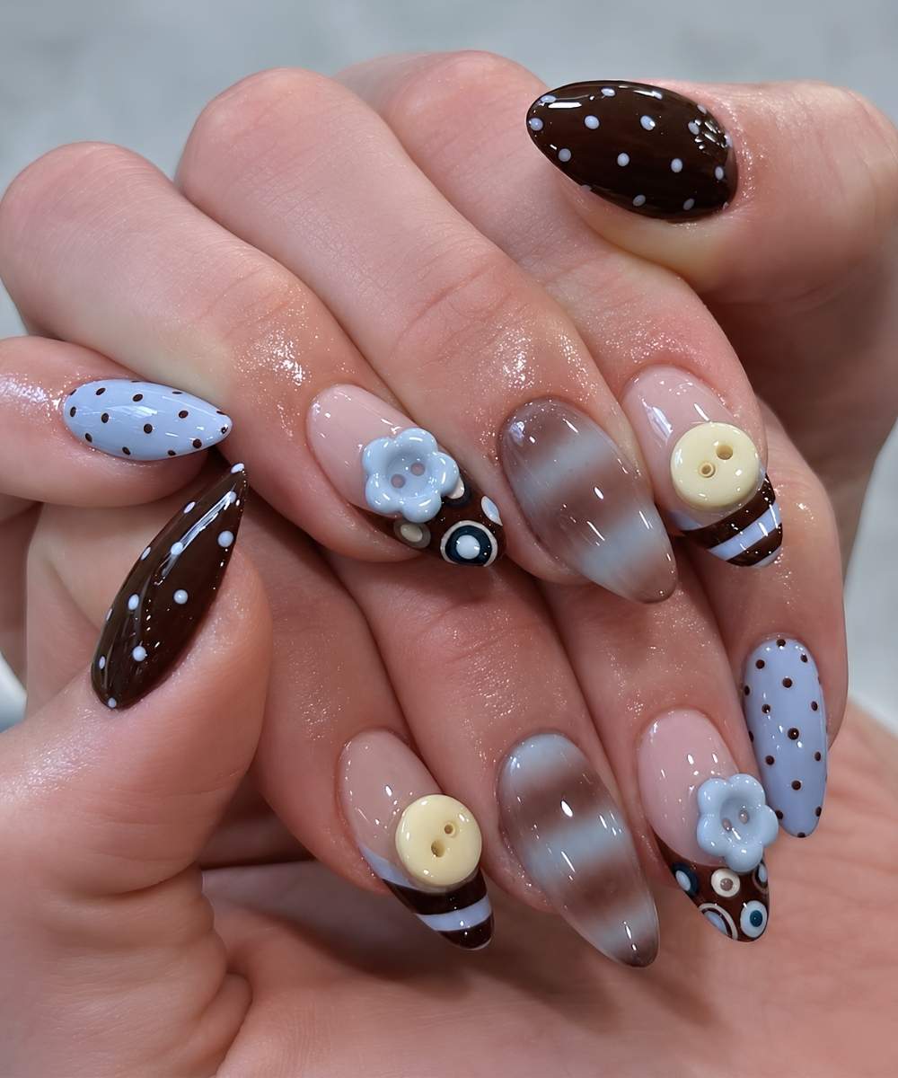 Brown and blue nails with buttons and polka dots