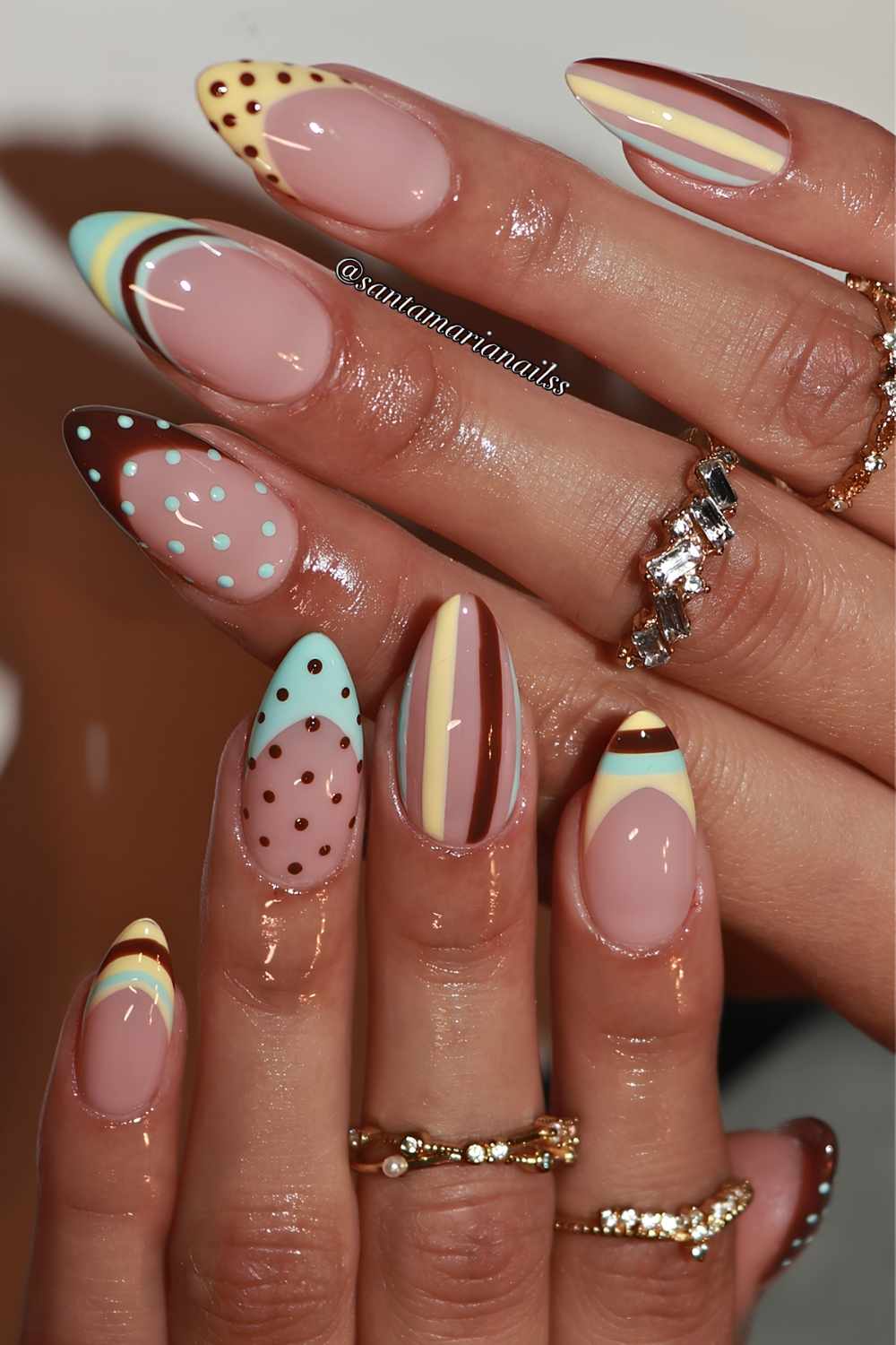 Brown blue and yellow nails with stripes and dots