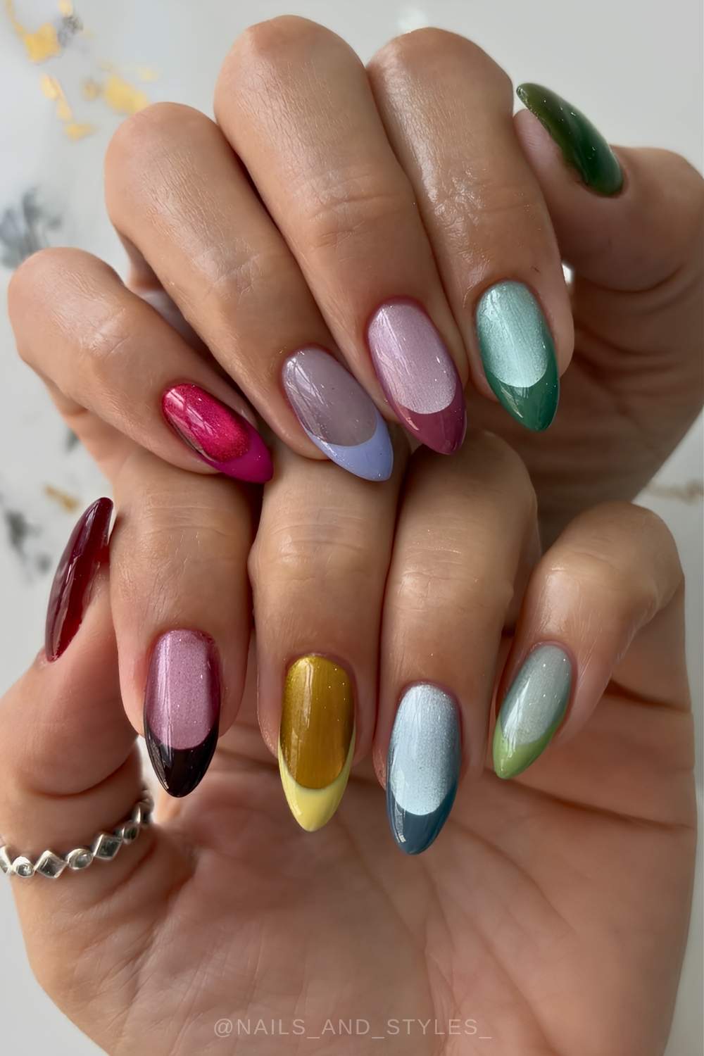 Colorful French nails on cat eye base