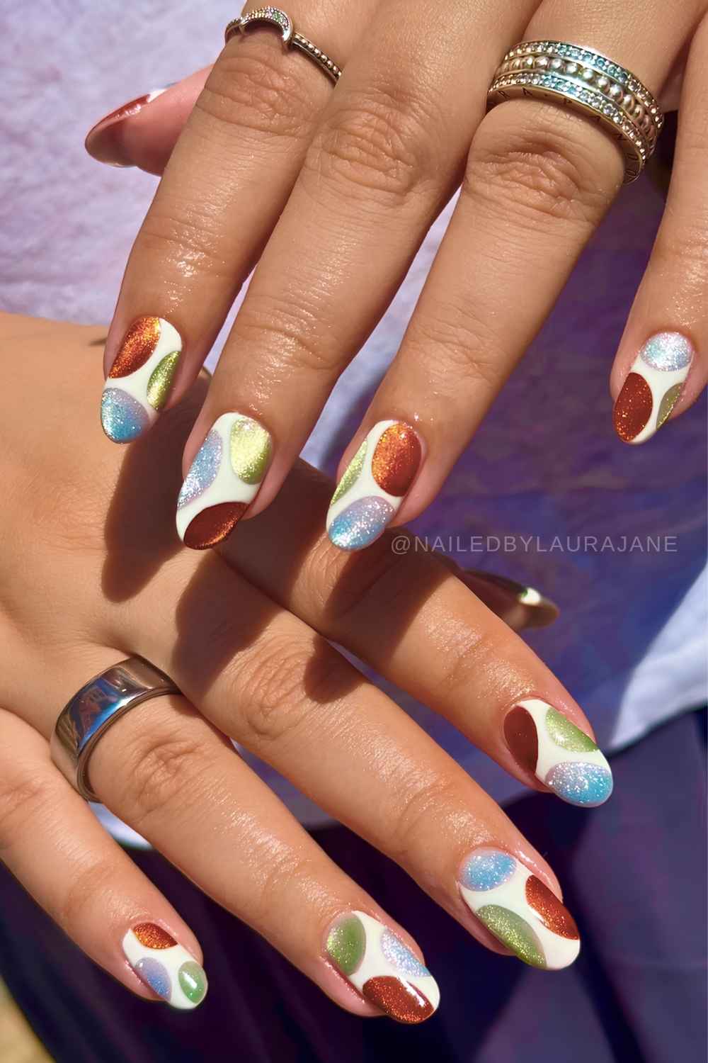 Colorful cat eye nails with abstract line art