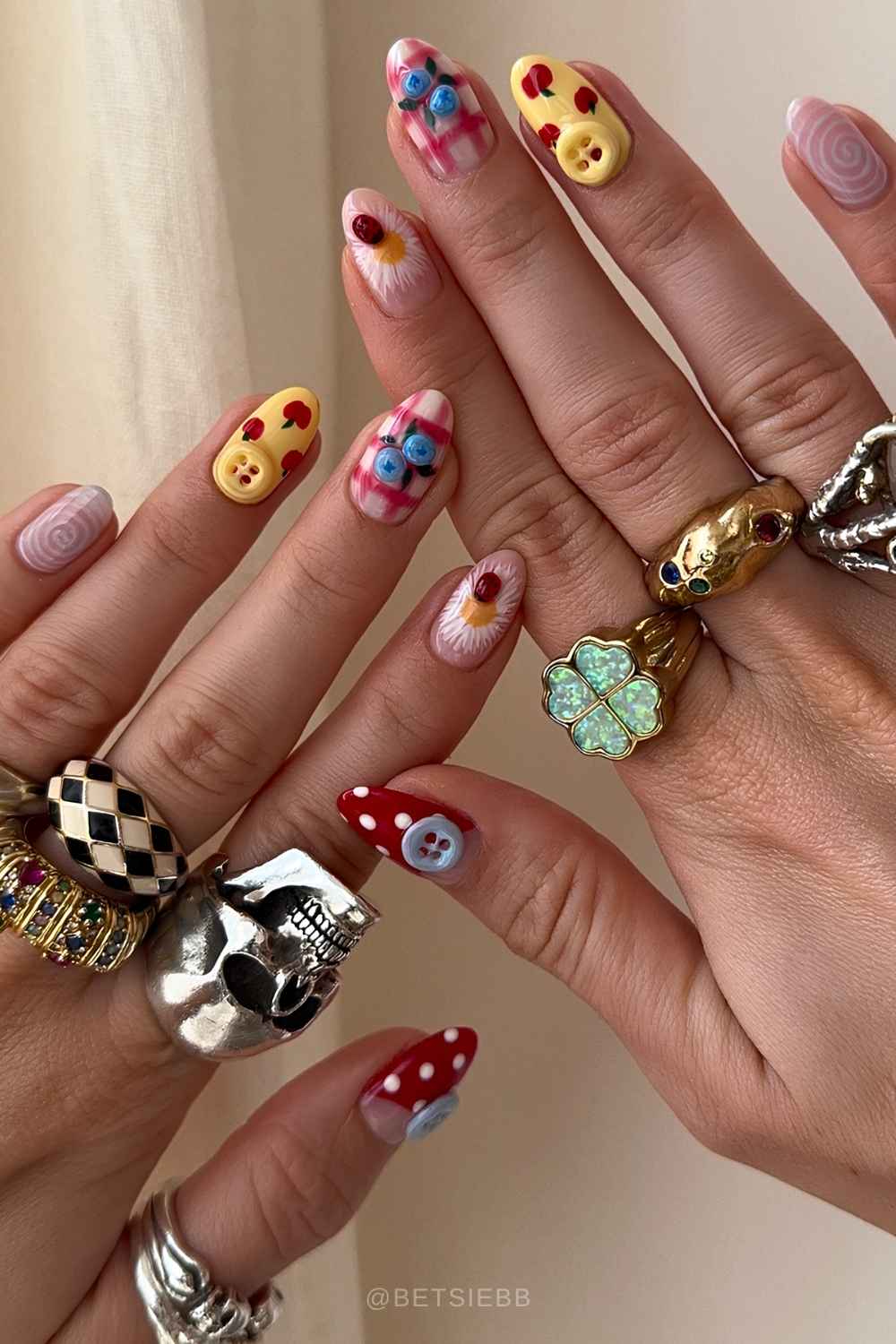 Colorful mani with gingham and button art
