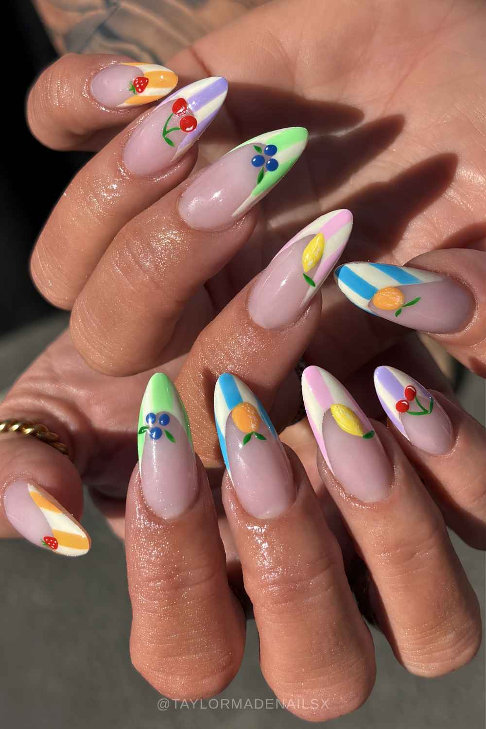 Colorful striped French mani with mixed fruit art
