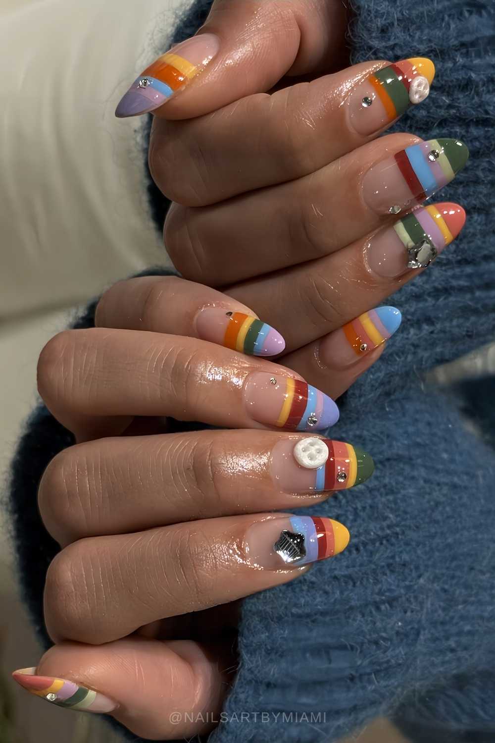 Colorful striped nails with 3d button art