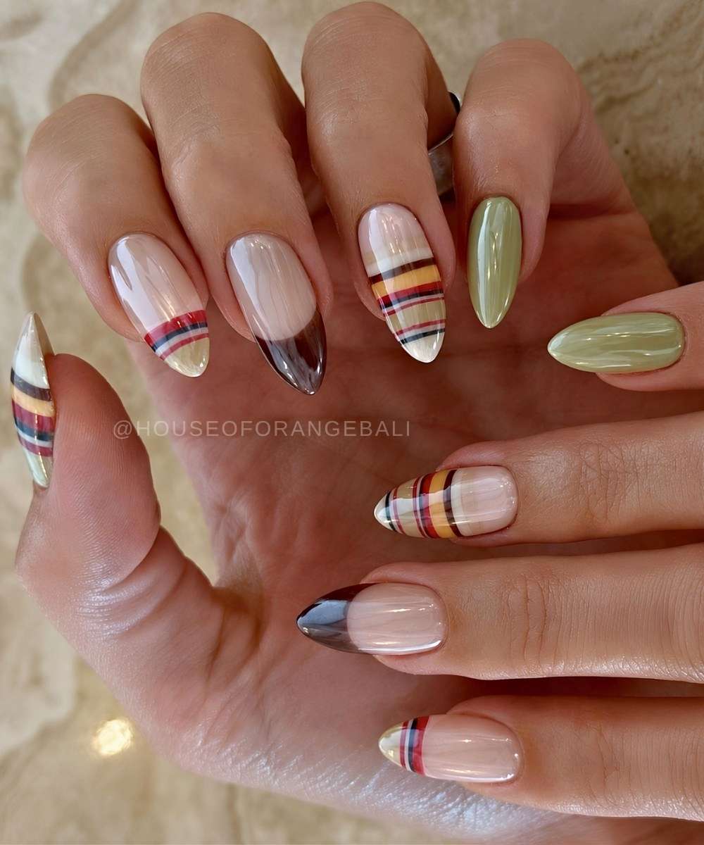 Green and brown chrome nails with stripes