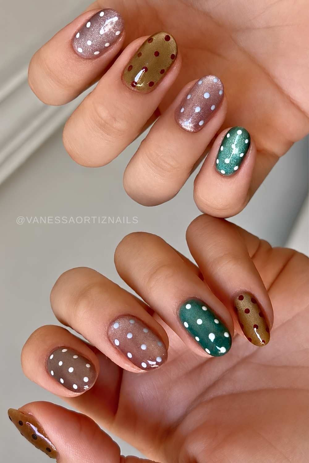 Jewel tone cat eye mani with polka dots