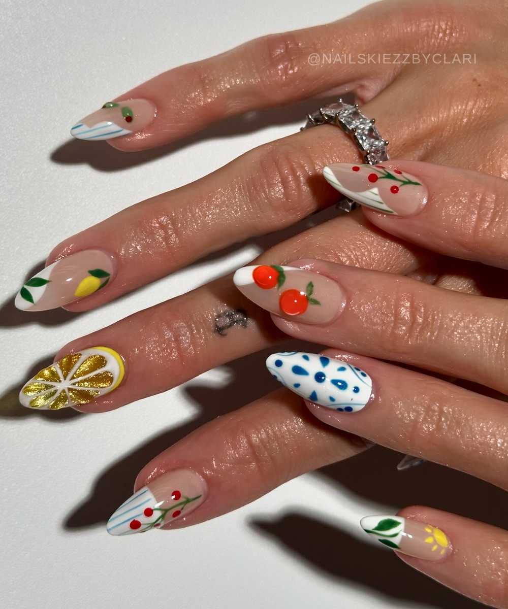 Mismatched nails with Italian summer inspired art