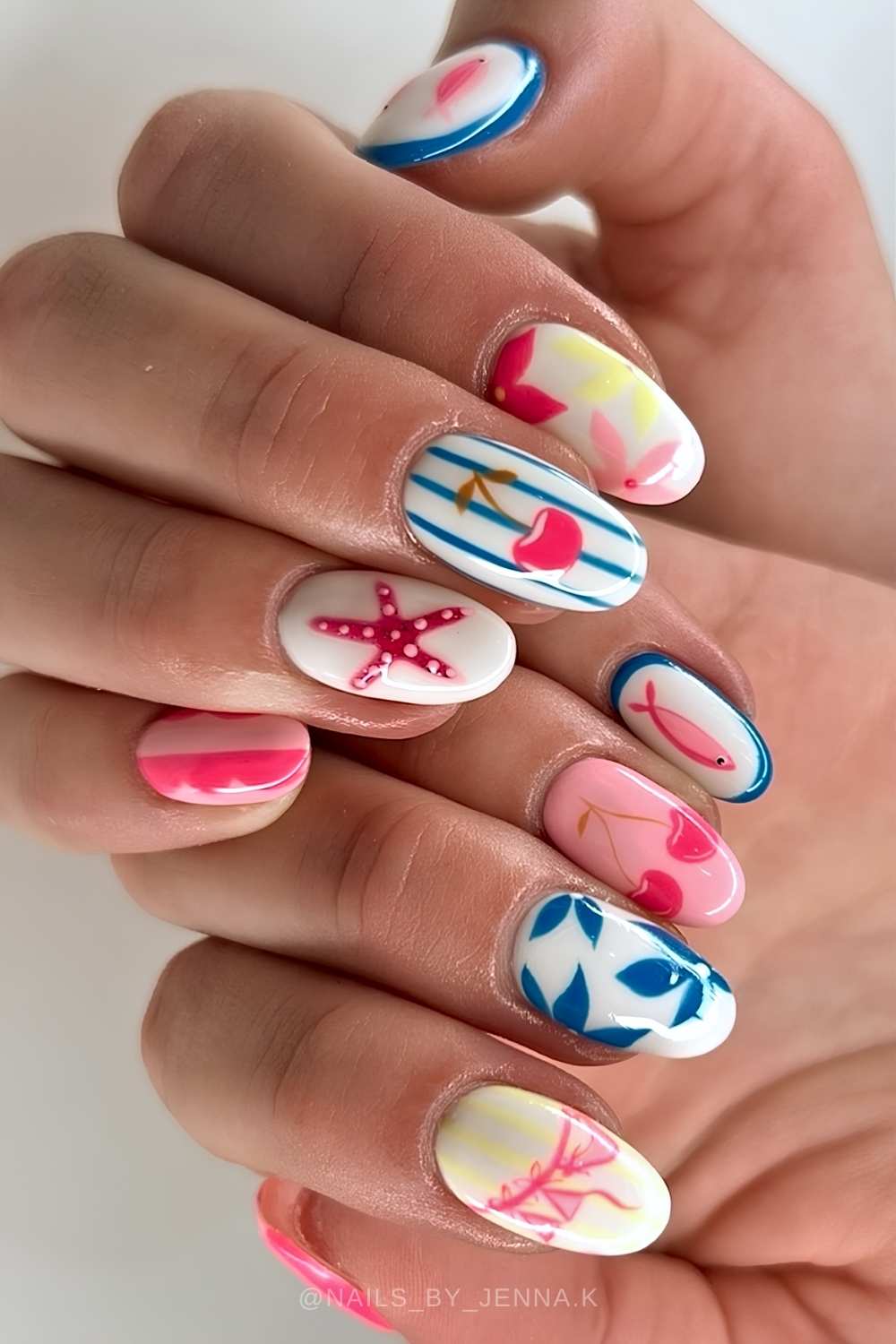 Mismatched summer nails with fish art