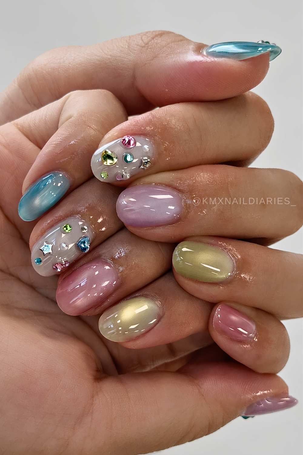 Multicolor cat eye mani with gems