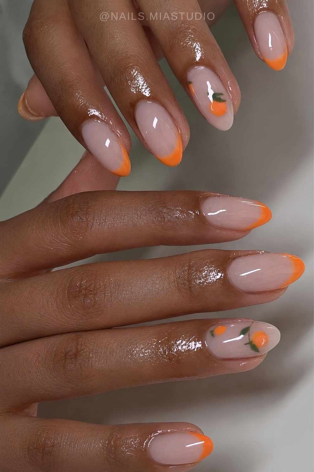 Orange French mani with citrus art