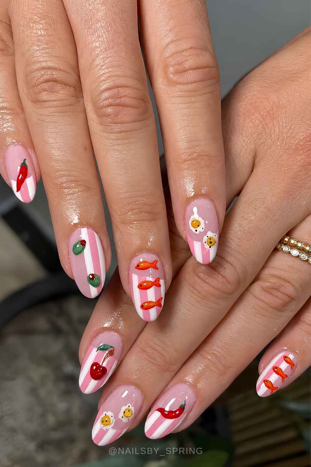 Pink striped nails with Italian summer art