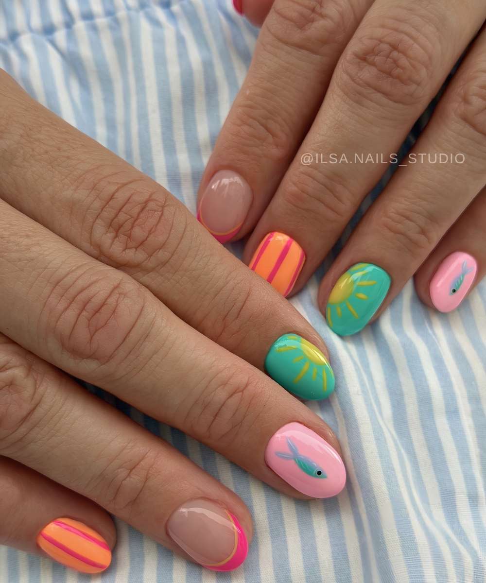Short colorful summer nails with fish motifs
