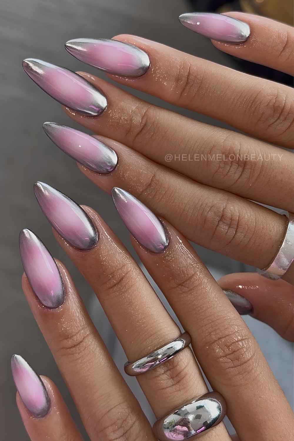 Silver chrome nails with pink aura shading
