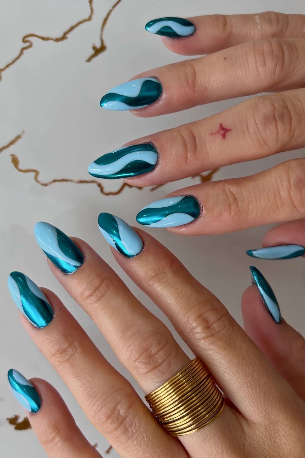 Abstract teal nails with mixed finishes