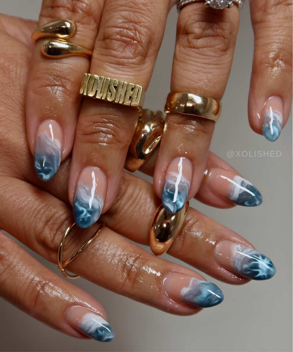 Blue and white ocean wave cat eye mani