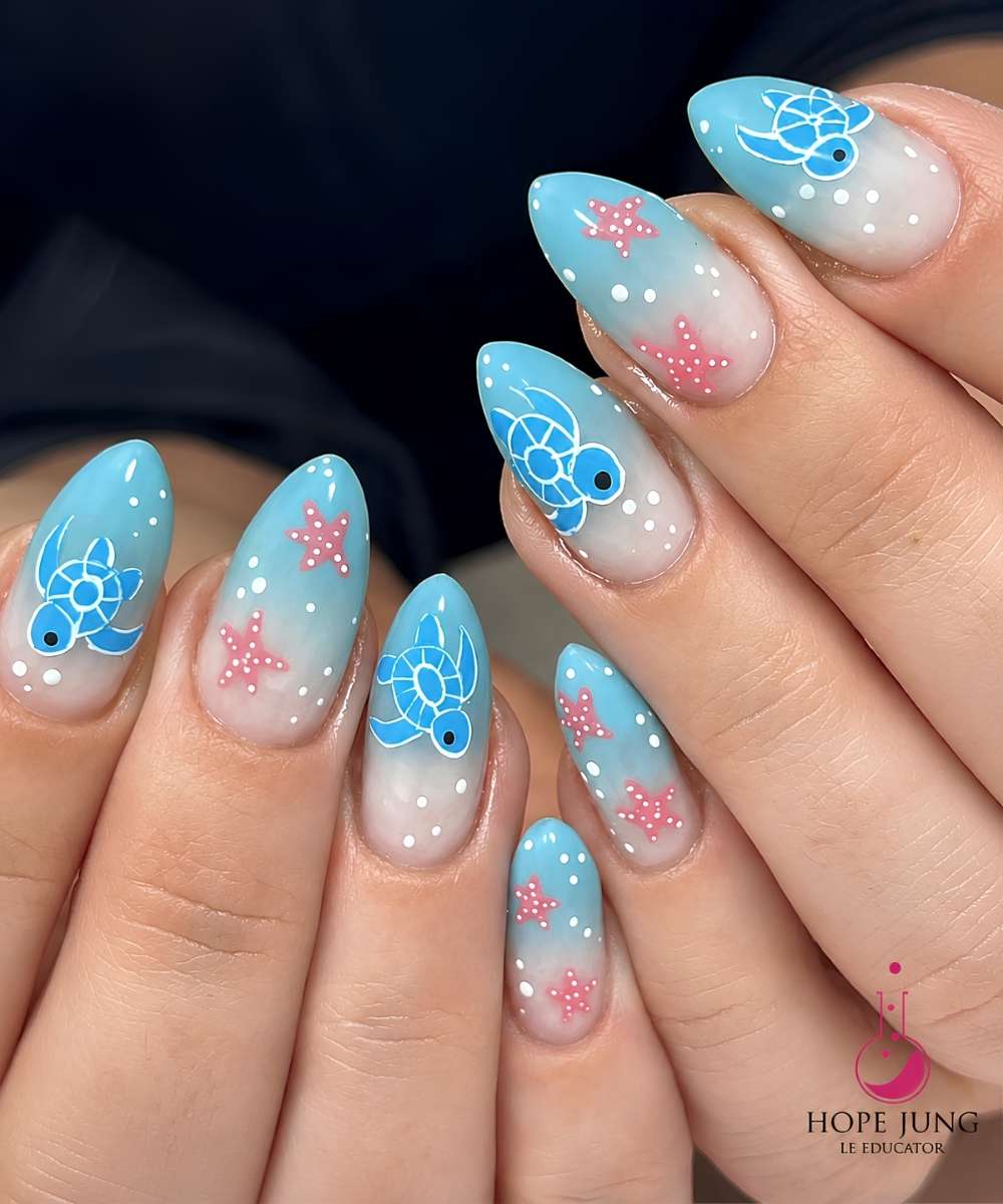 Blue ombre nails with sea turtles and starfish