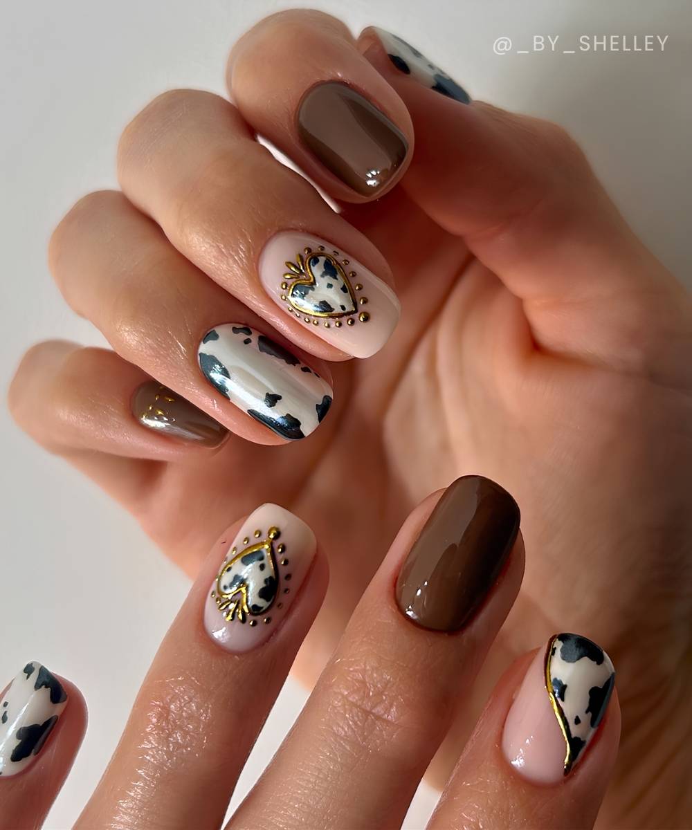 Brown nails with cow print and heart art