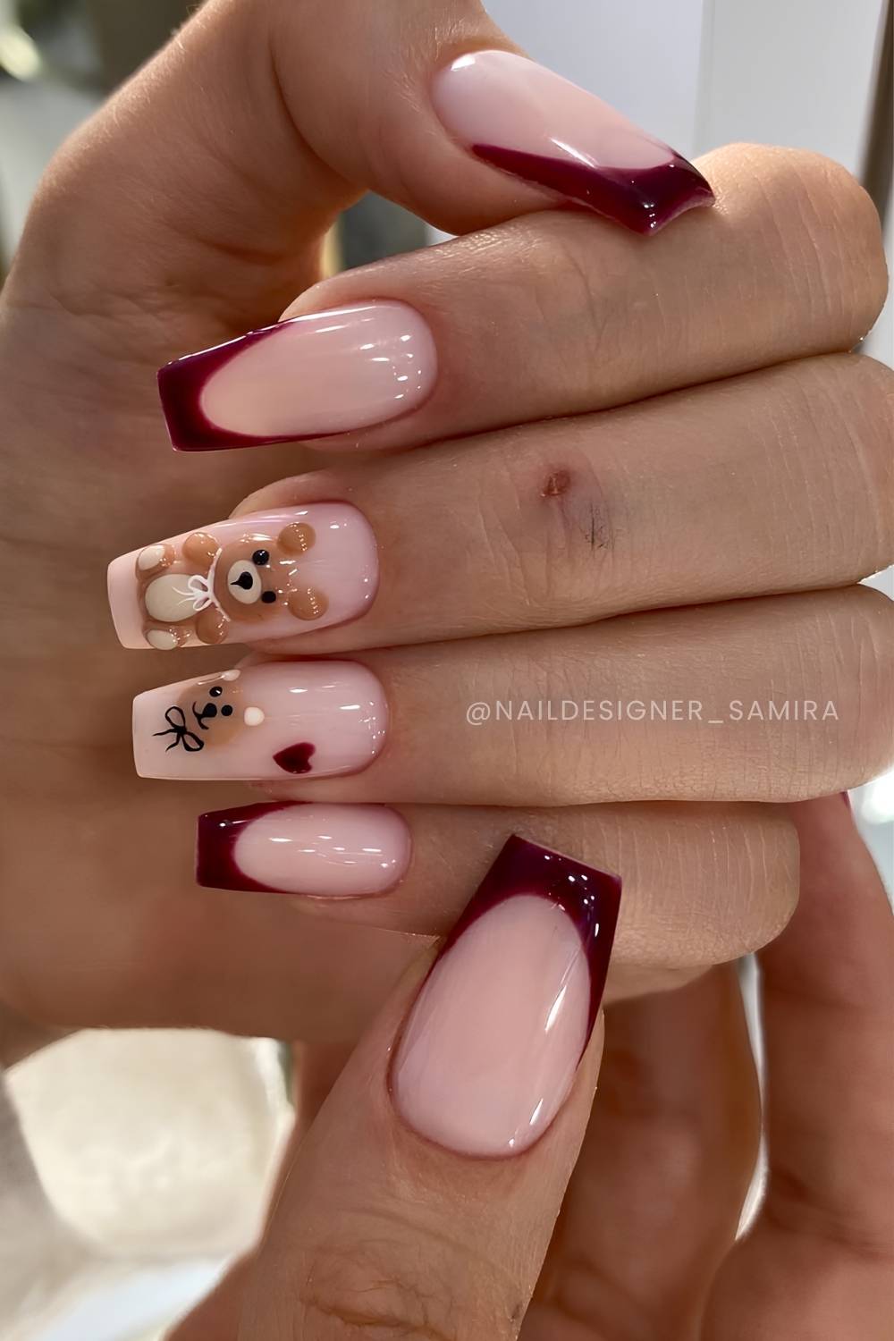 Burgundy French mani with teddy bear art
