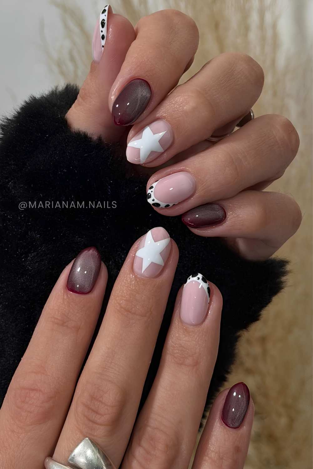 Burgundy cat eye mani with stars and cow print