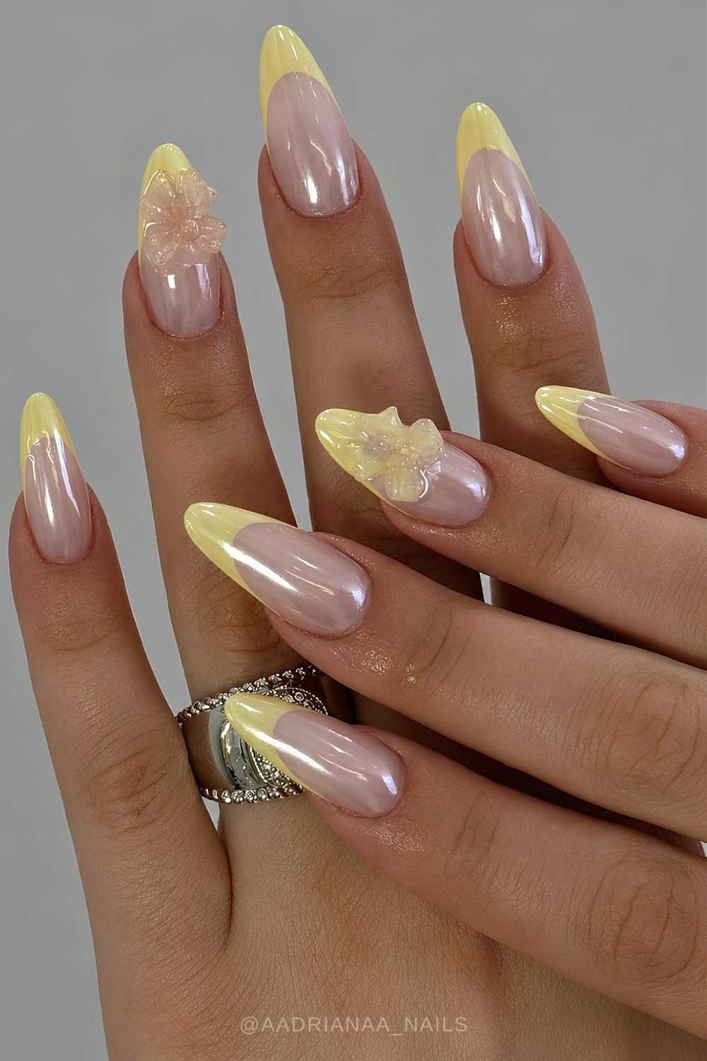 Chromed yellow French nails with 3d bows