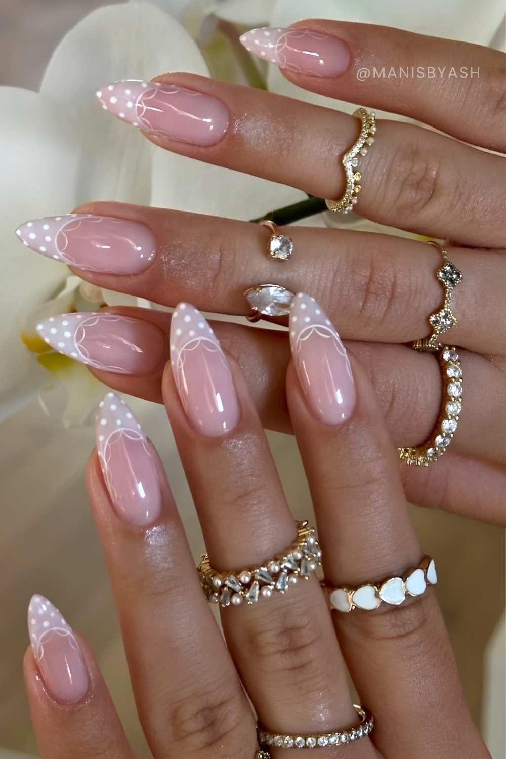 Gray French nails with lace art and polka dots