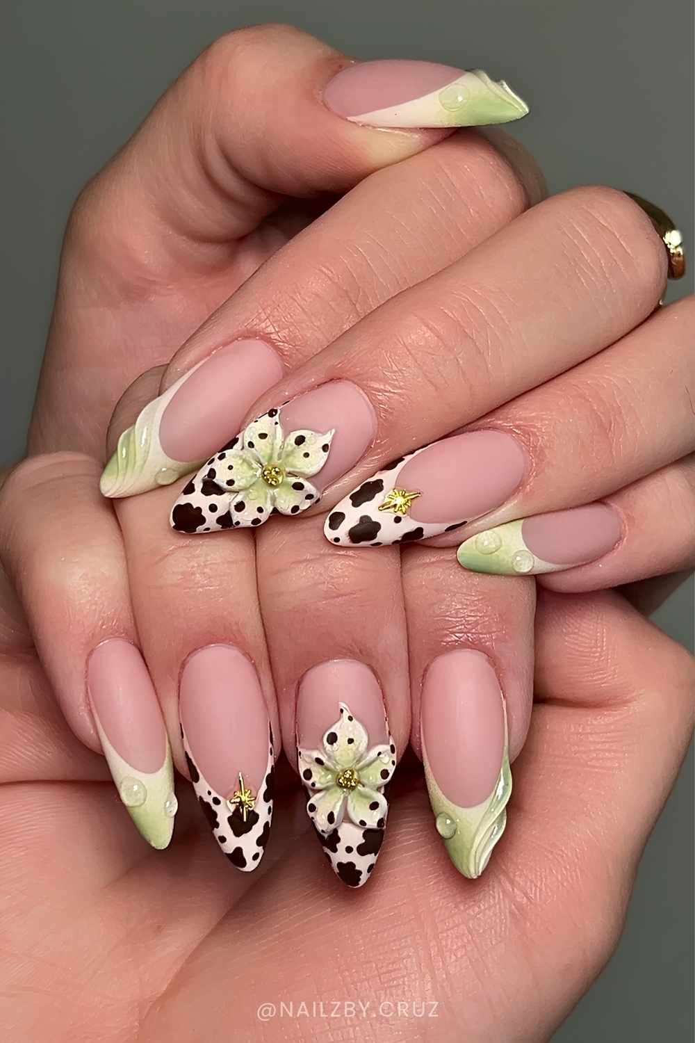 Green French nails with cow print and flowers
