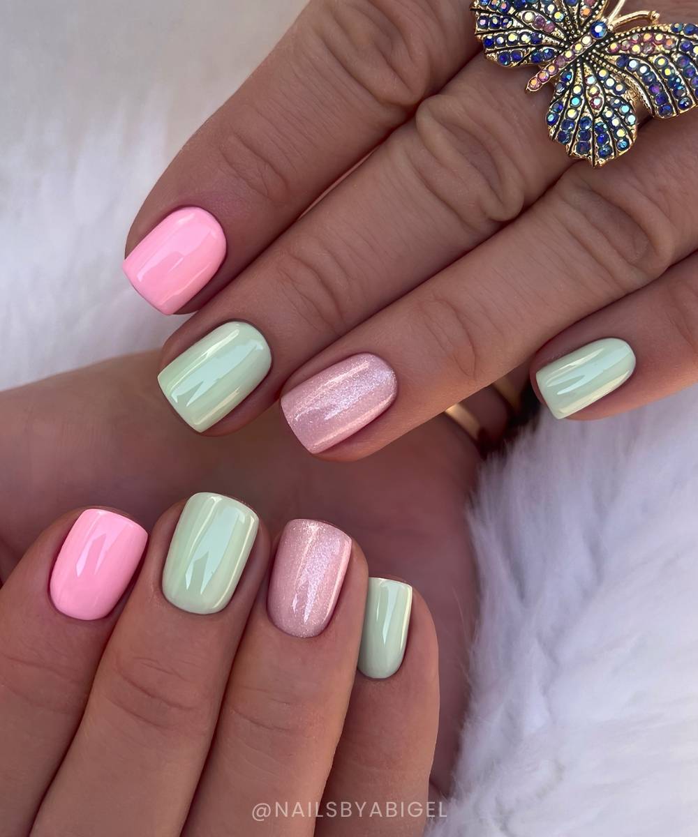 Green and pink skittle nails with accent shimmer