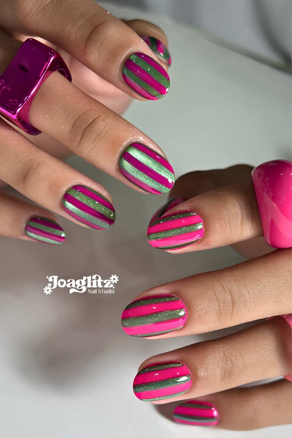 Green velvet mani with magenta stripes