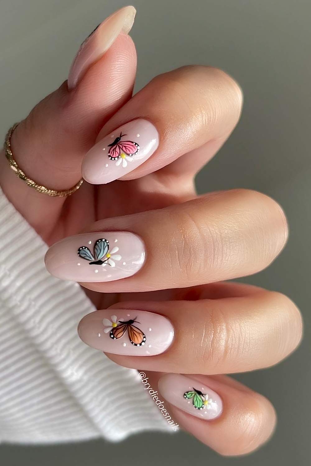 Milky mani with colorful butterflies